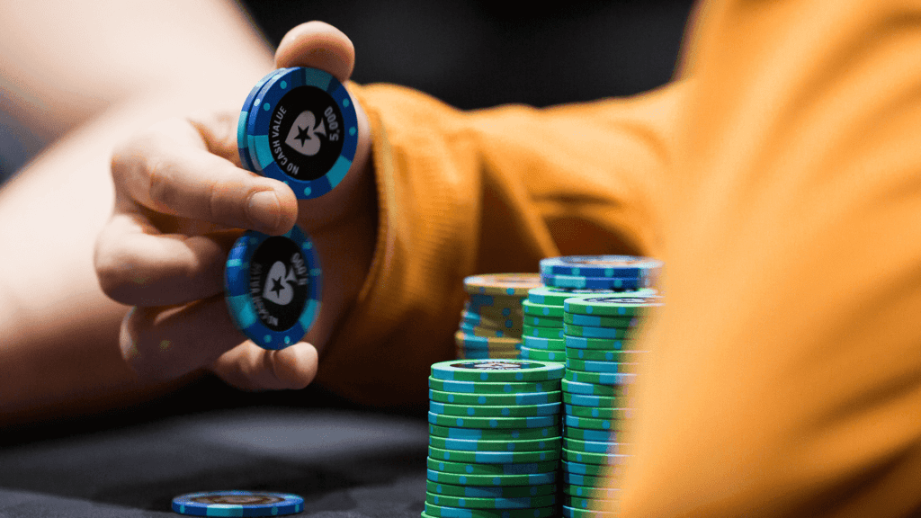 Shuffling blue poker chips