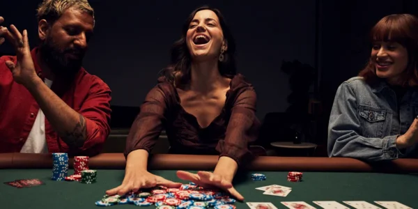 Poker player winning a big multiway pot