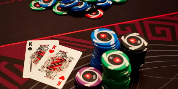 Poker chips and cards illustrating blind defense tactics and equity calculations
