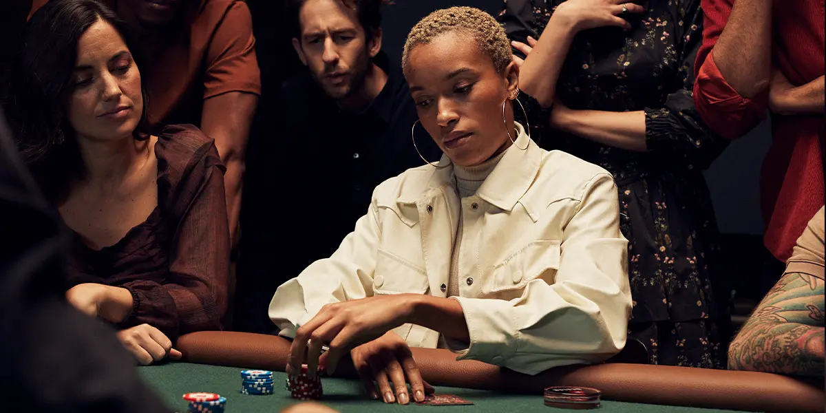 Focused player analyzing an opponent's betting pattern.