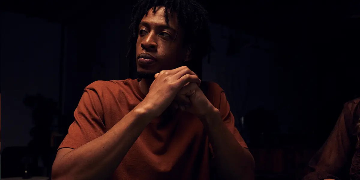 Player facing a preflop decision with a weak offsuit ace