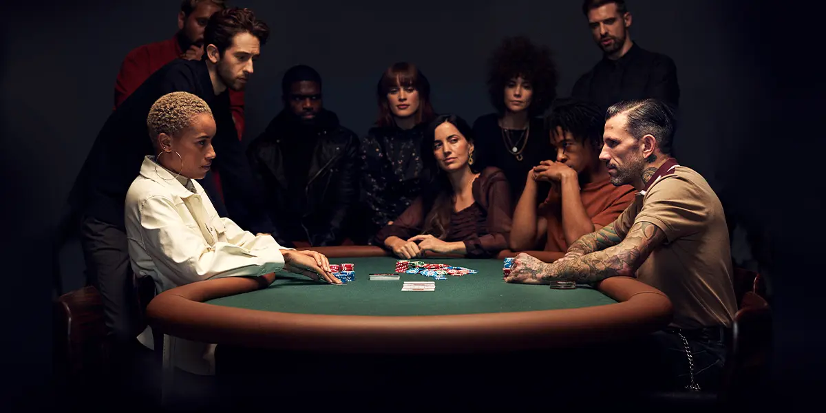 Players competing at a Texas Hold’em poker table