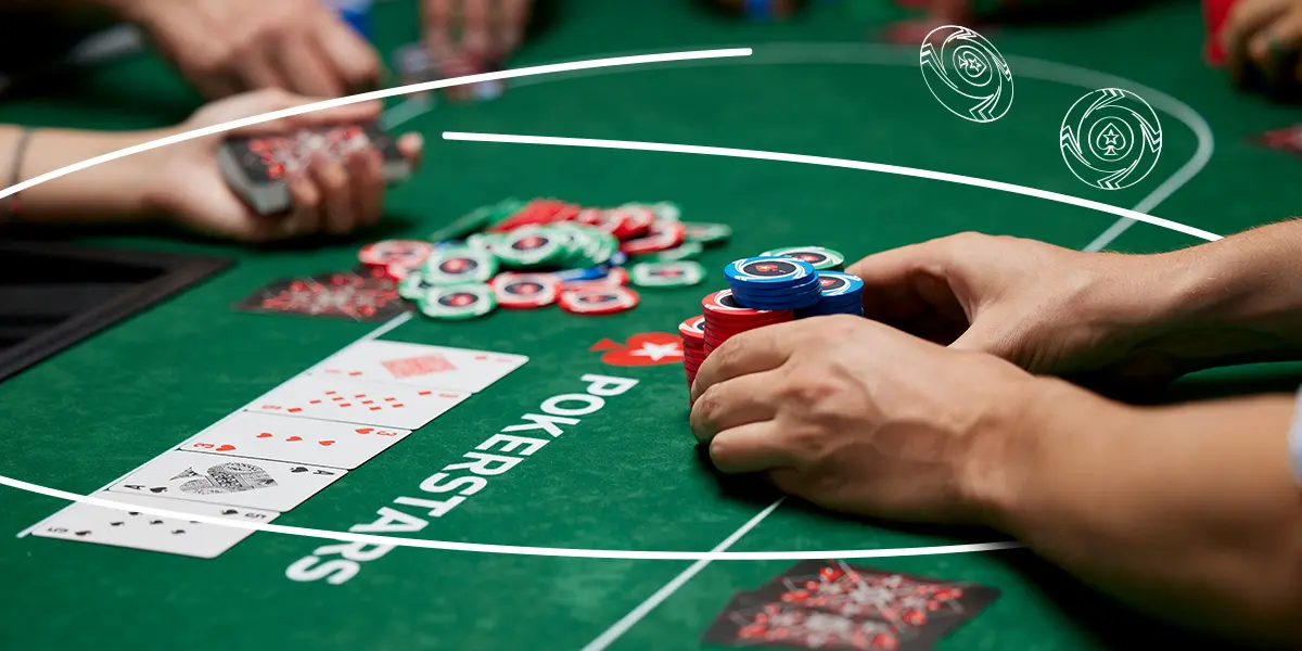 Poker player pushing a large stack of chips for an overbet.