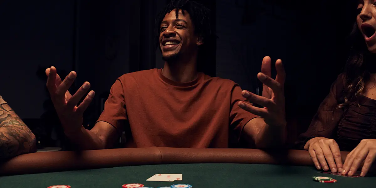 Poker player celebrating winning a big pot