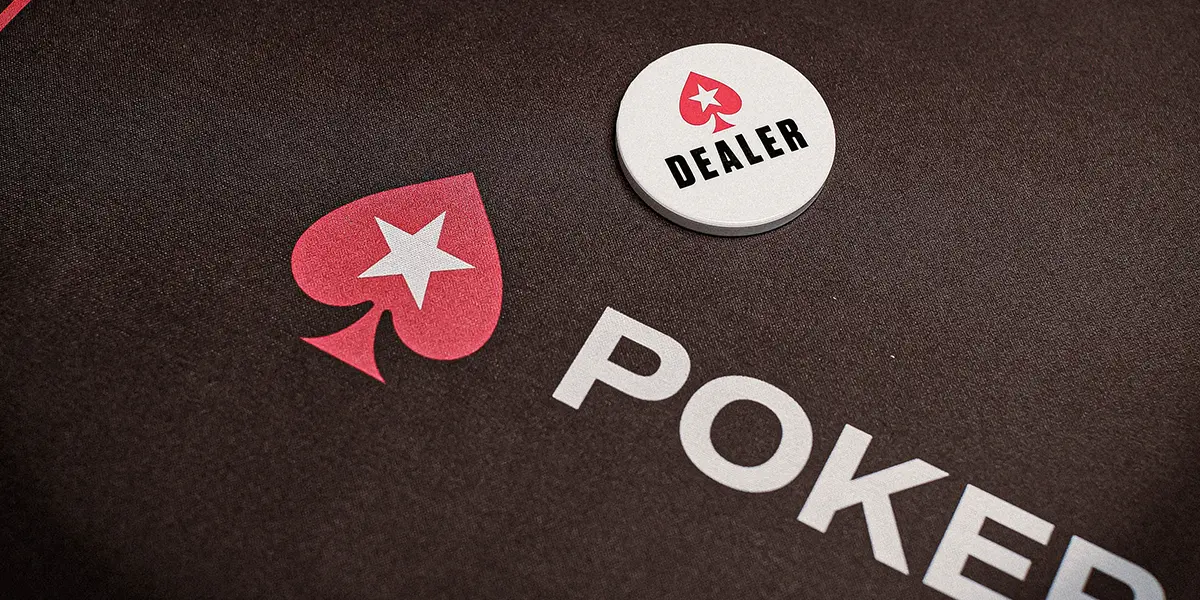 Dealer button placed on a PokerStars live poker table