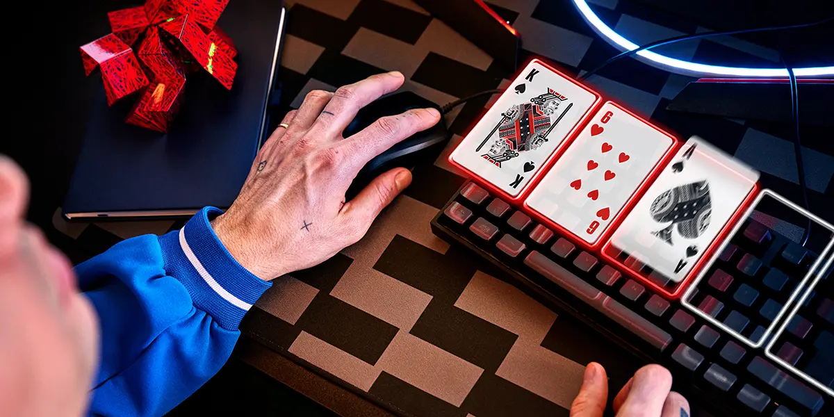 Creative concept showing a poker flop on a computer keyboard, symbolizing online poker and strategy. 