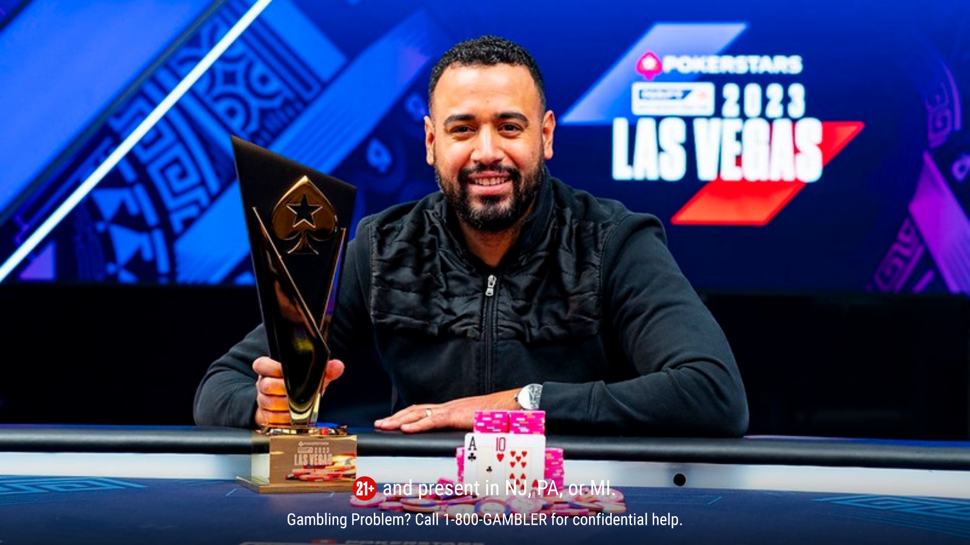 Sami Bechahed with the trophy he earned winning the NAPT Las Vegas Main Event in 2023