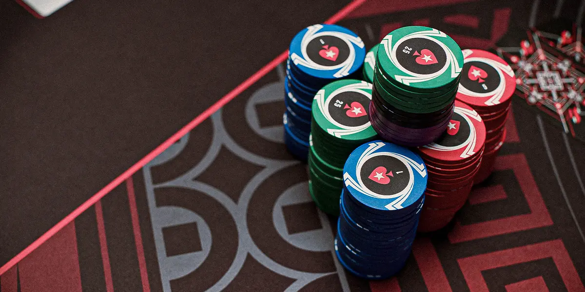 Close-up of poker chips during a high-stakes tournament.